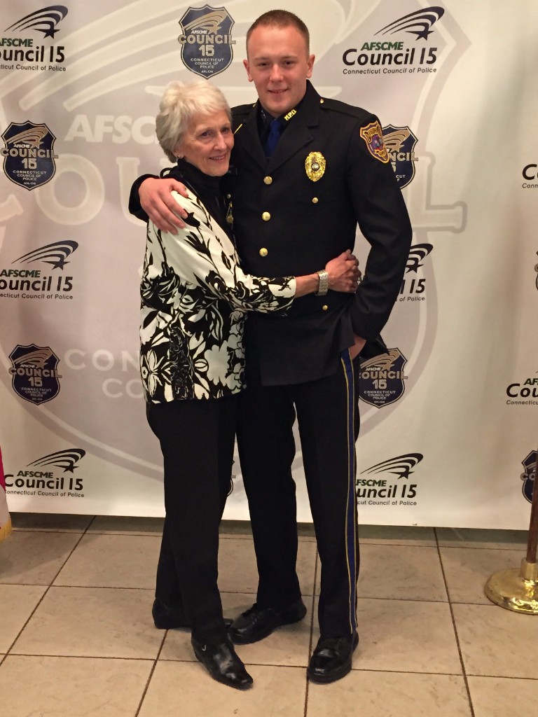 John-Paul Dorais in police uniform with family, AFSCME Council 15 Connecticut Council of Police